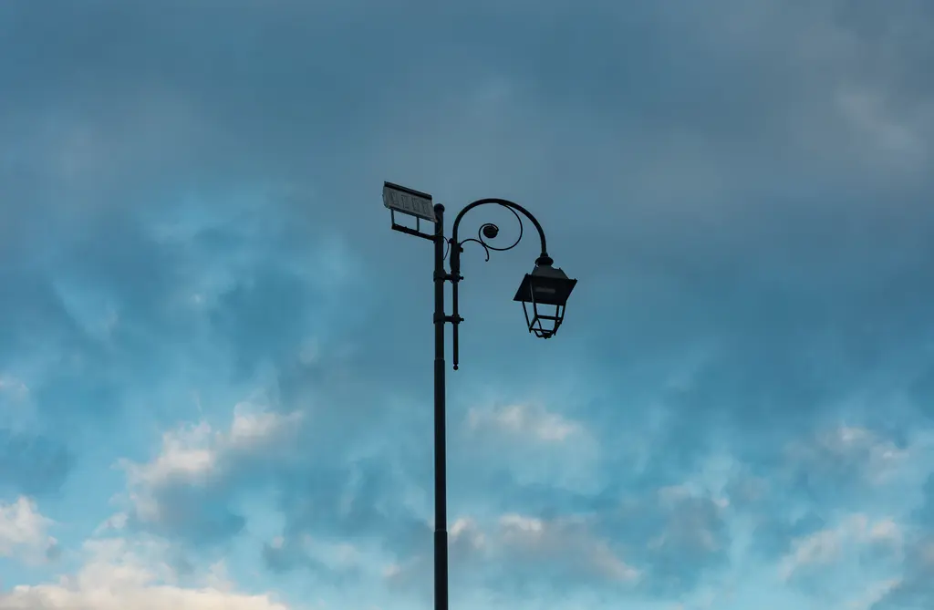 Solar street light against an open sky